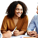 **Multicultural workplace:** A diverse group of colleagues from different ethnic backgrounds are working together in an office setting, smiling and collaborating on a project. The atmosphere should feel inclusive and supportive.